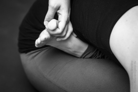 Ardha baddha padma pascimottanasana - photo by Gabor Szendrei